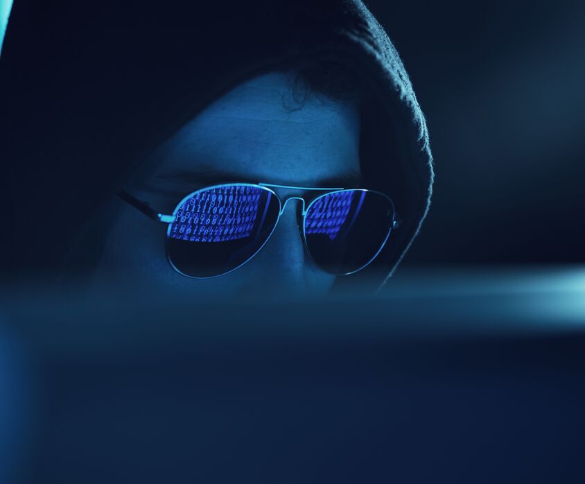 Man in hoodie with glasses